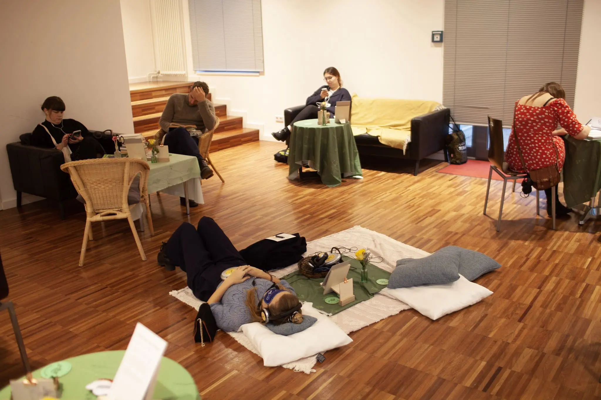 People lying on the floor relaxing