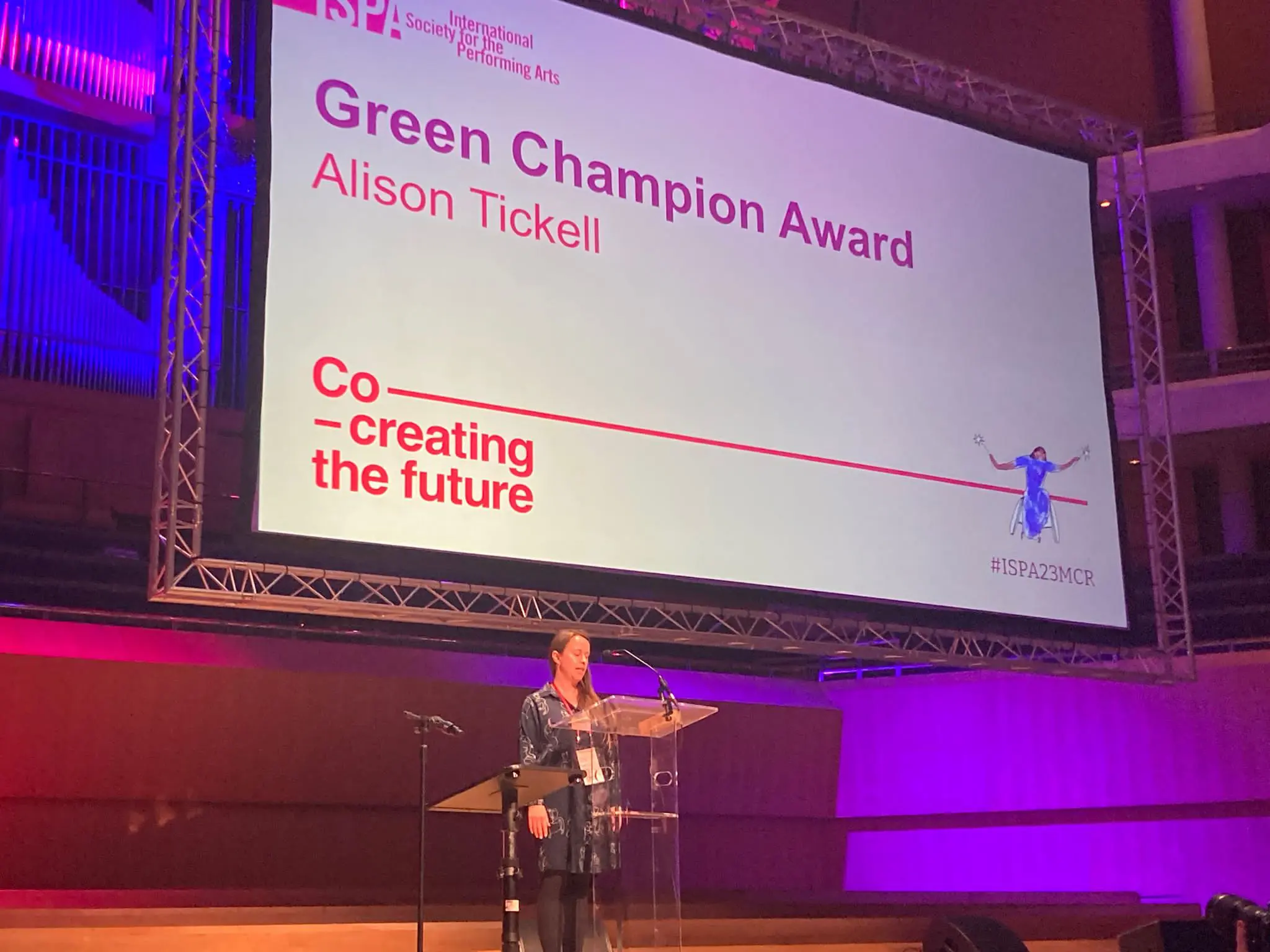 Sarah Leech accepts an award on behalf of Alison Tickell.