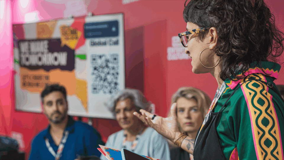 people close-up at COP30 presentation/panel